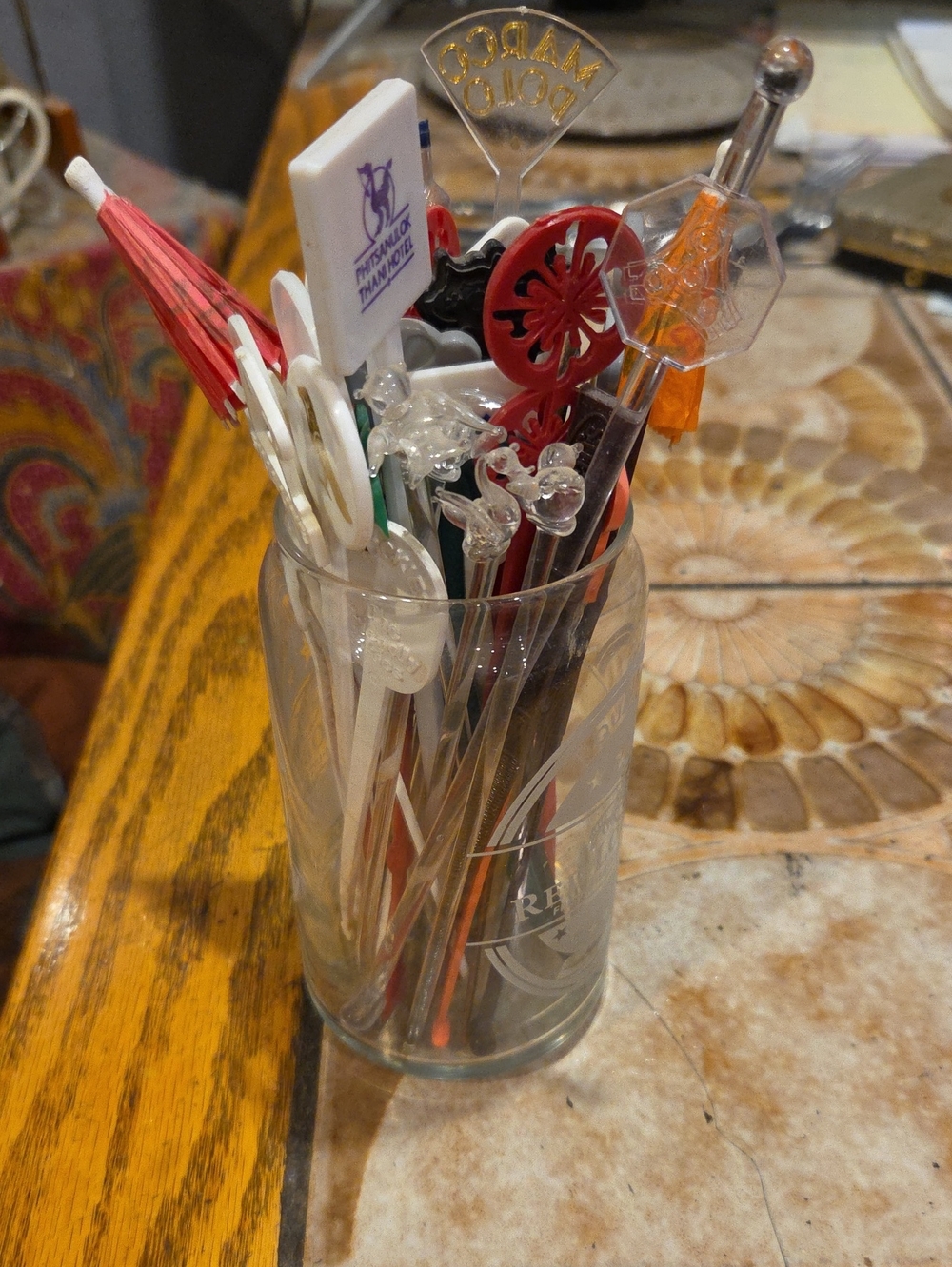Assorted Vintage Drink Stir Sticks in Clear Glass Holder